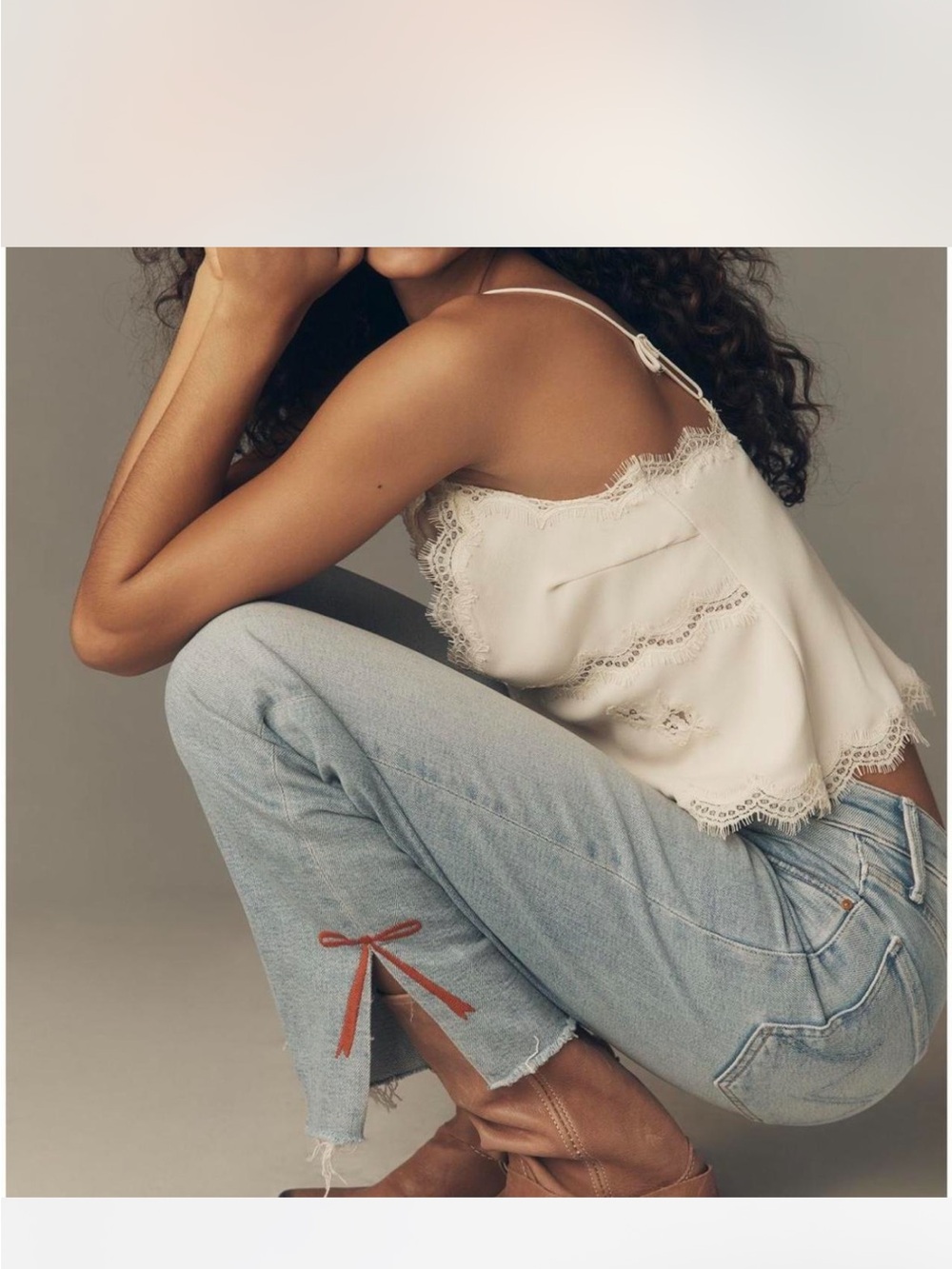 Anthropologie Light Wash Straight Leg Jeans with Red Bow Ankle Detail